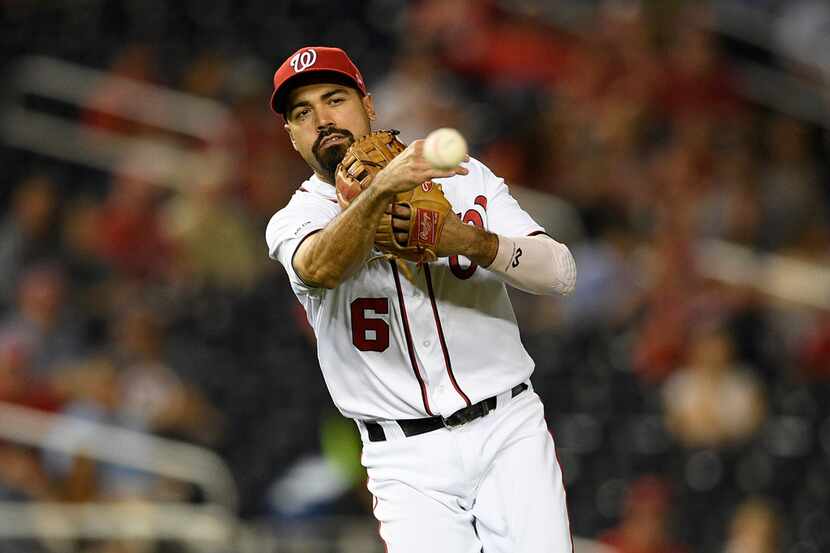 Washington Nationals third baseman Anthony Rendon throws to first to get out Philadelphia...