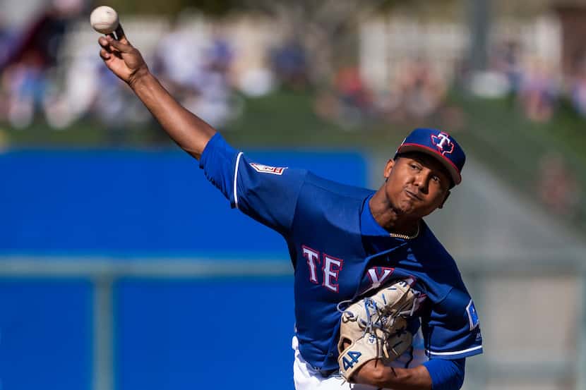 Texas Rangers pitcher JosÃ© Leclerc pitches during the fifth inning of a spring training...