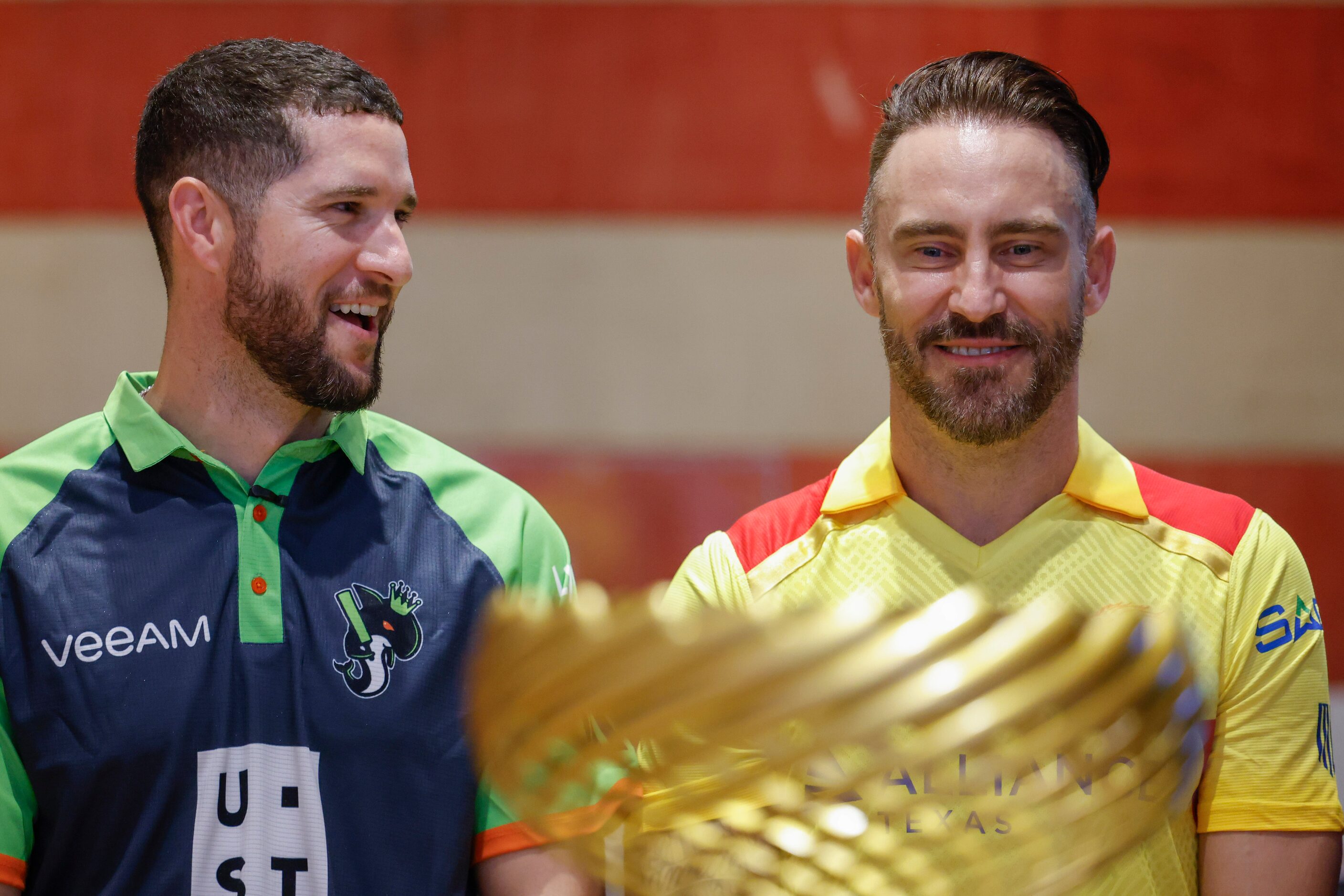 Seattle Orcas captain Wayne Parnell (left) talks to Texas Super Kings captain Faf du Plessis...