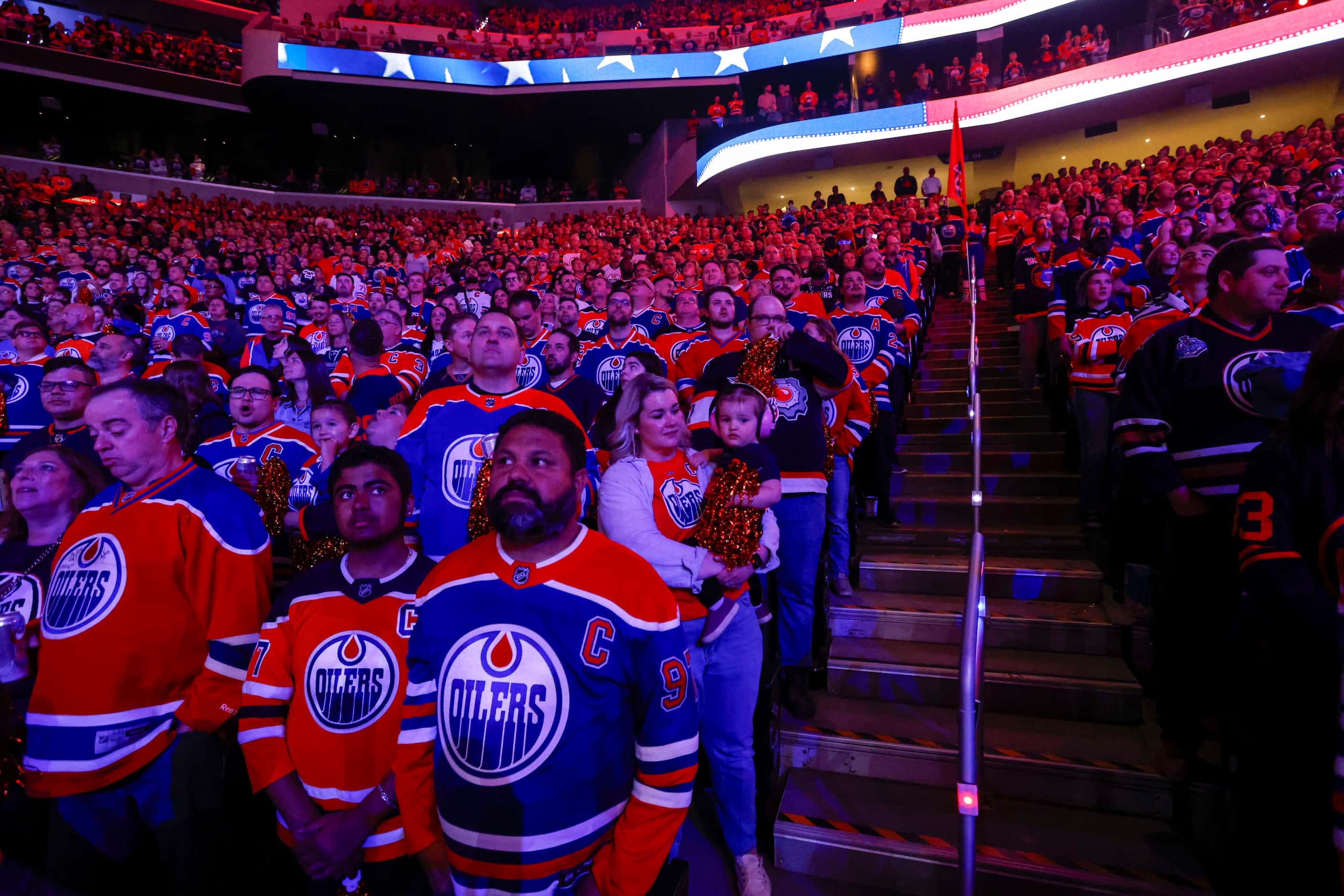 Edmonton Oilers fans stand for the American national anthem before Game 6 of the Stanley Cup...