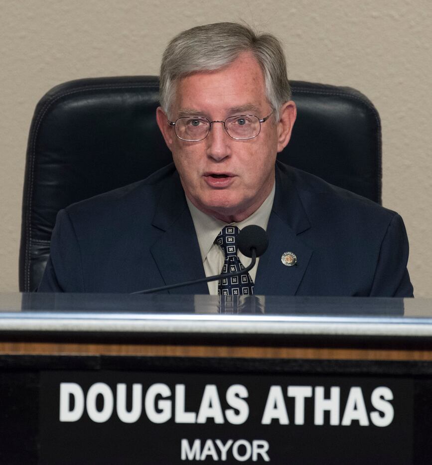 Garland Mayor Douglas Athas talks during a  city council meeting on Tuesday.