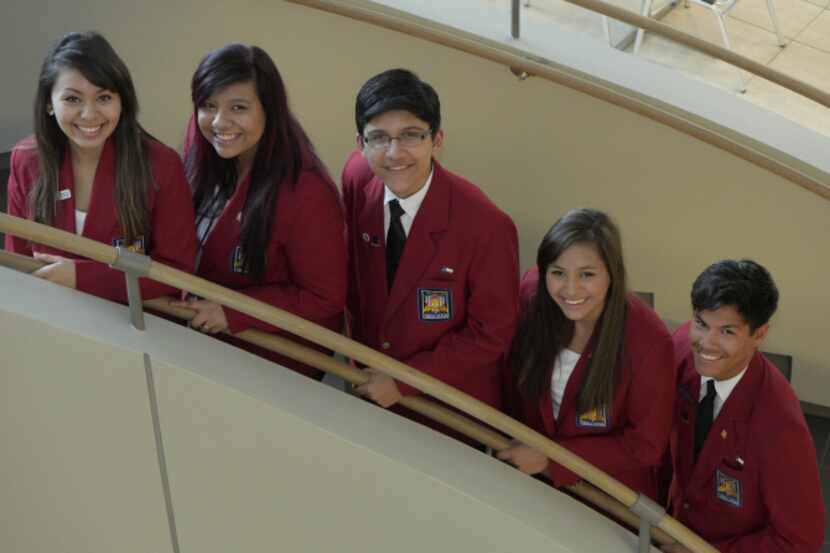 Dubiski Career High School seniors Cecilia Serrano (left), Cristina Casarez, Bernardo Velez,...