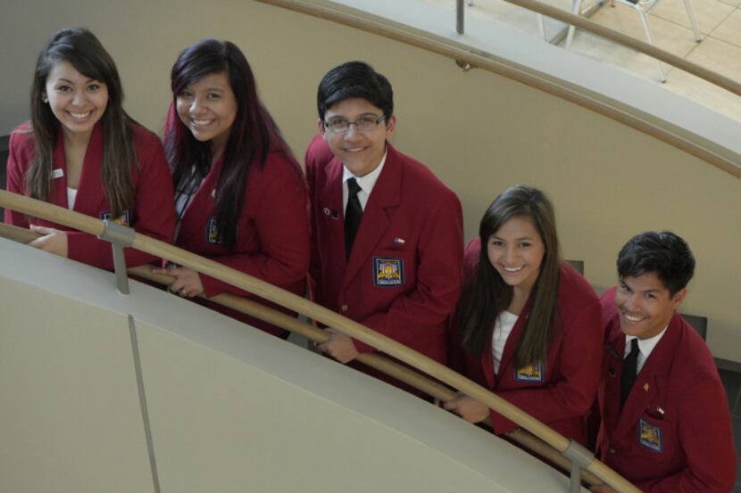 Dubiski Career High School seniors Cecilia Serrano (left), Cristina Casarez, Bernardo Velez,...