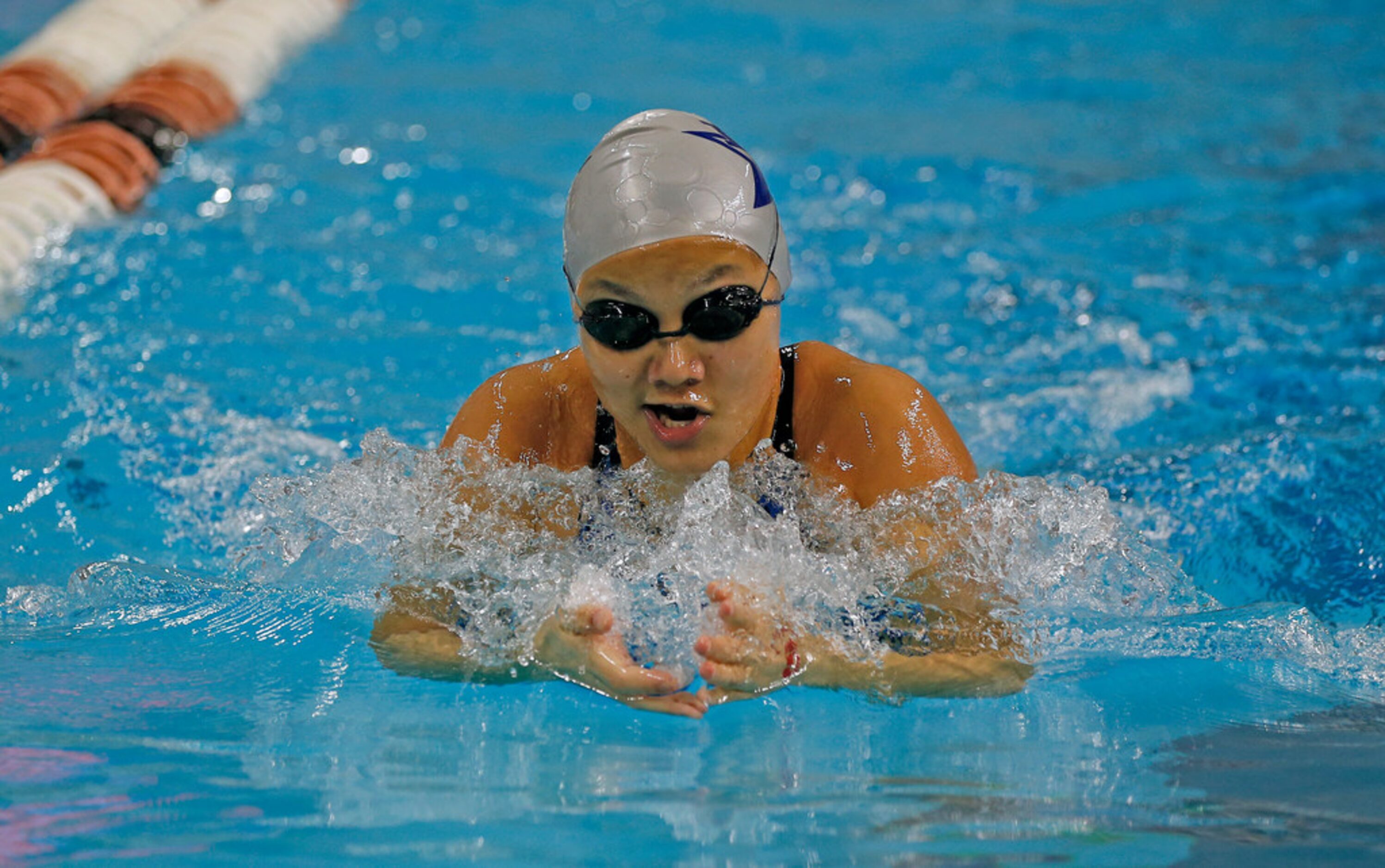 Class 5A preliminaries of the UIL state swimming and diving meet were held in Austin, Texas...