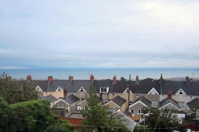 
Dylan Thomas once wrote about ships sailing over rooftops. The view of Swansea Bay may be...