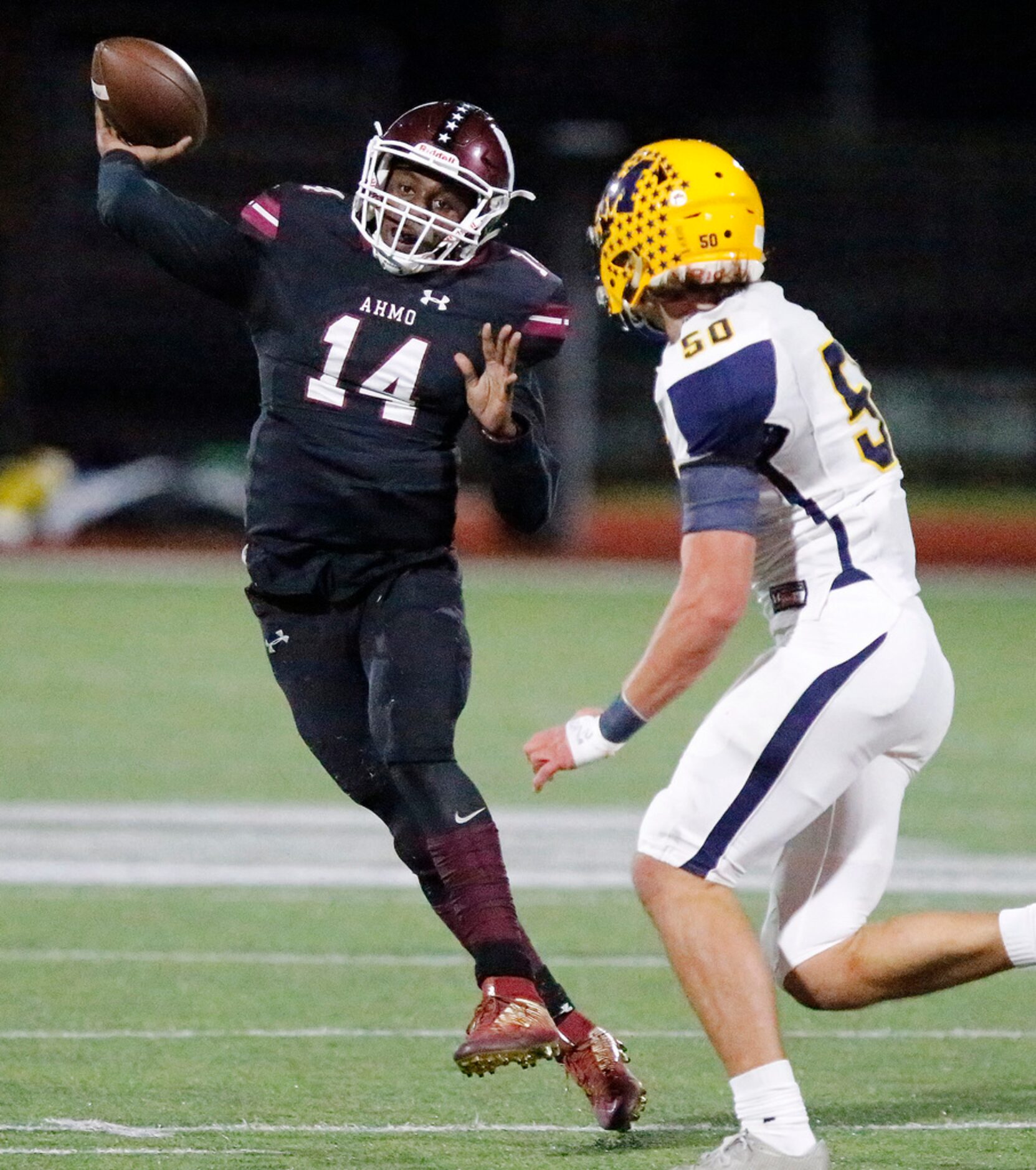 Wylie High School quarterback Rashad Dixon (14) is hurried on his throw by McKinney High...