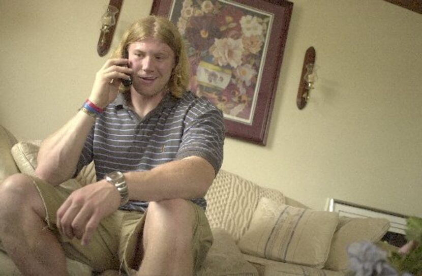 Bobby Carpenter, 22, of Lancaster, takes a conference call with the Dallas Cowboys media...