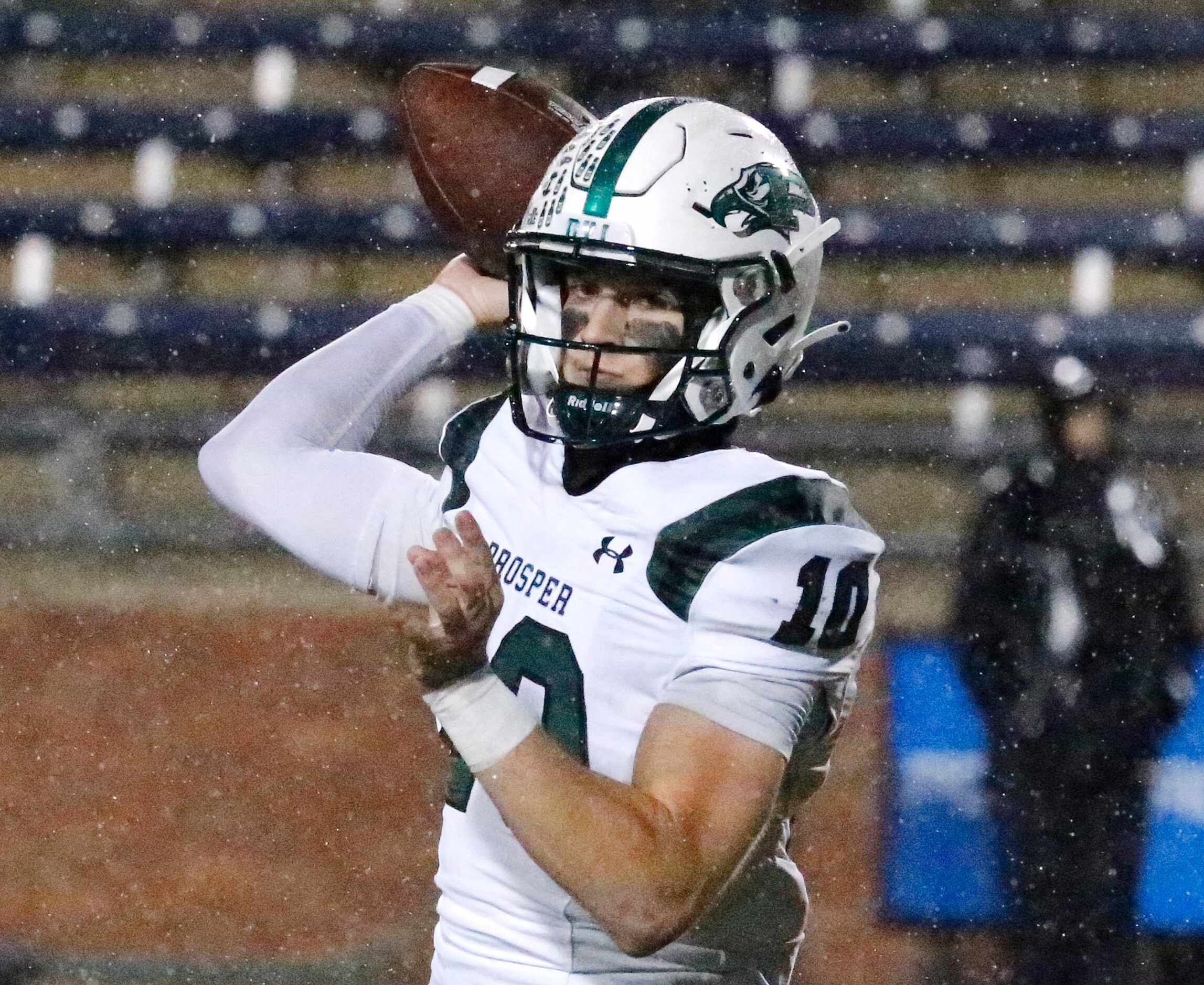 Prosper High School quarterback Harrison Rosar (10) throws a pass during the first half as...