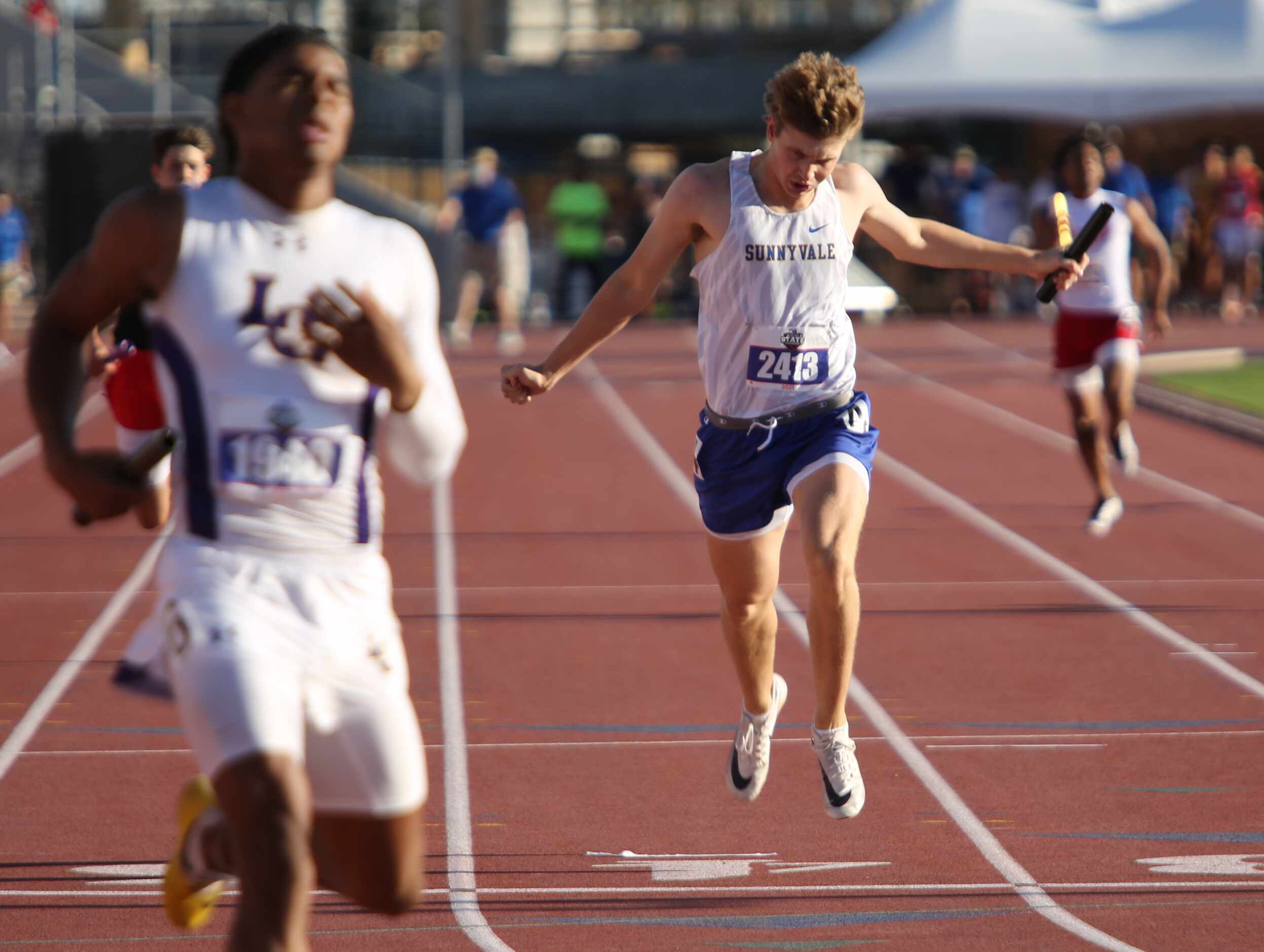 Sunnyvale's Joey Bruszer finishes in third during his 4A boys 4x200 relay event at the UIL...