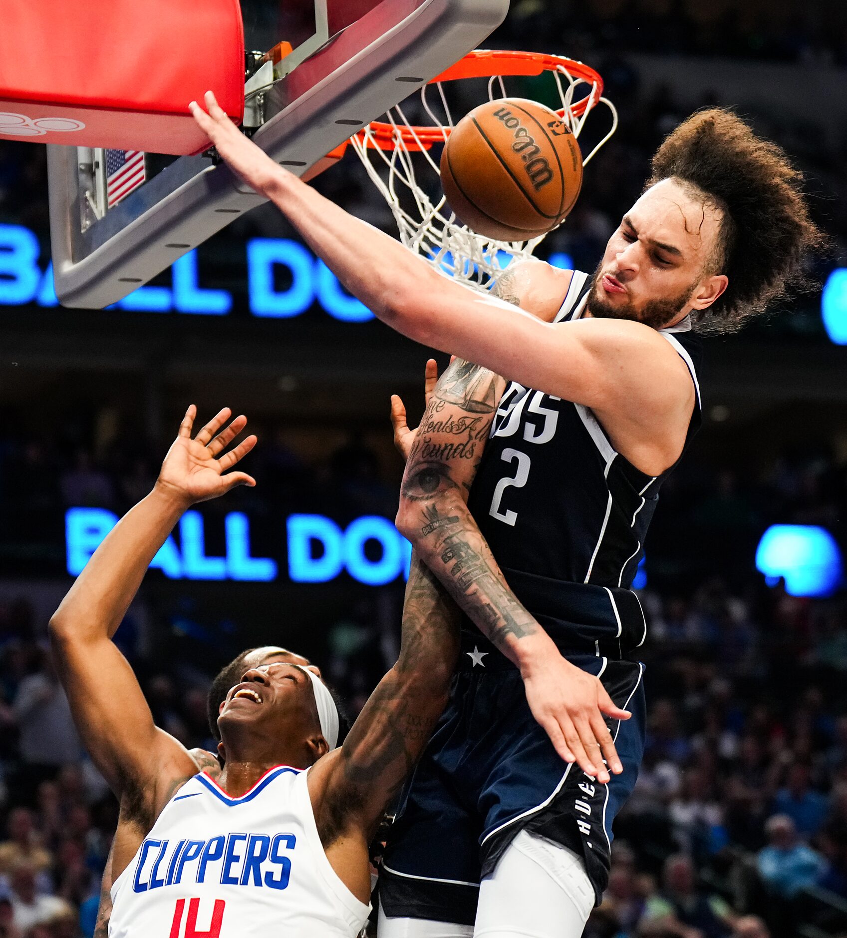 Dallas Mavericks center Dereck Lively II (2) blocks a shot by LA Clippers guard Terance Mann...