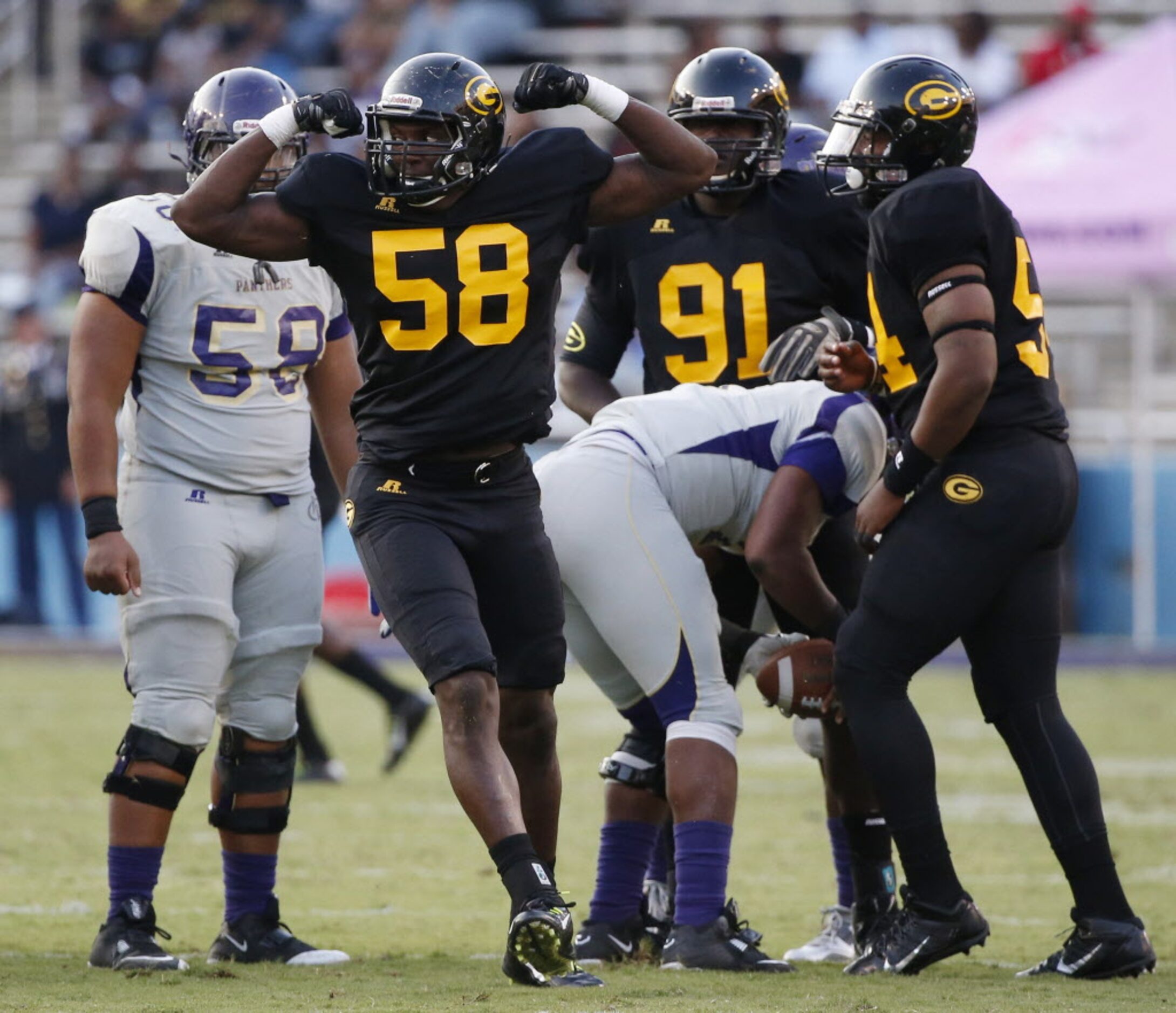 Grambling State defensive end Michael Jolivet (58) reacts after sacking Prairie View A&M...