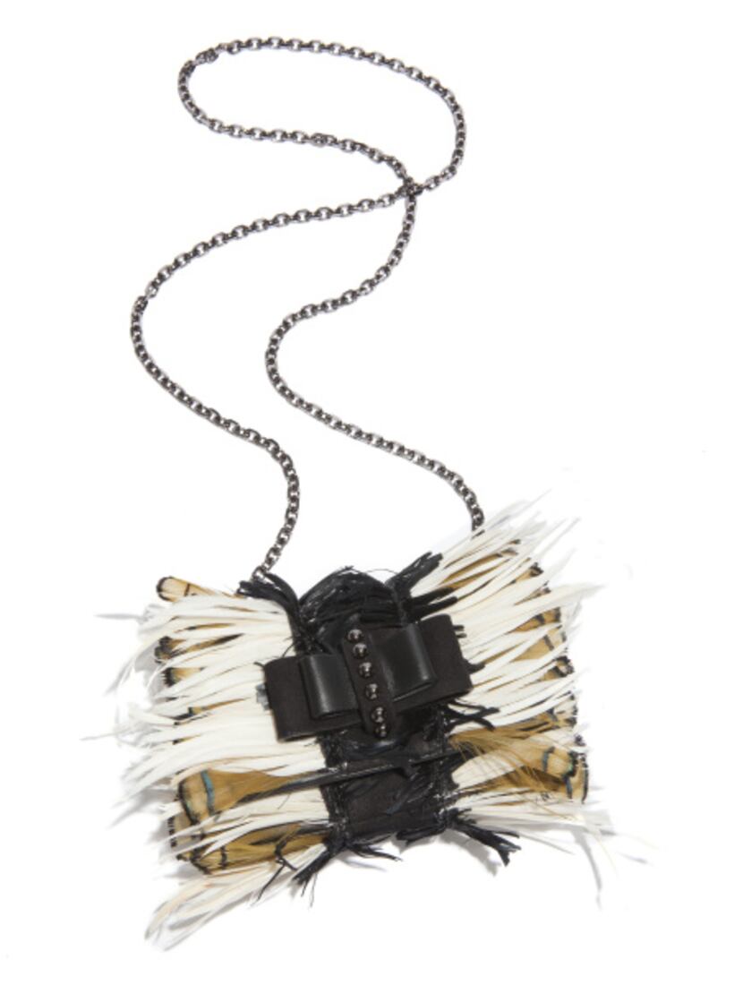 Christian Louboutin “Sweet Charity” feathered shoulder bag, $1,195, Christian Louboutin