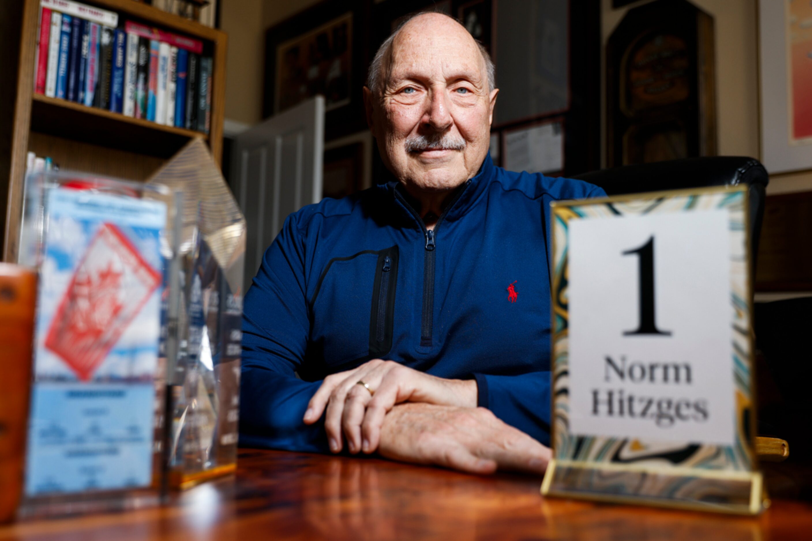 Local sports radio legend Norm Hitzges poses for a portrait at his home on Saturday, June...