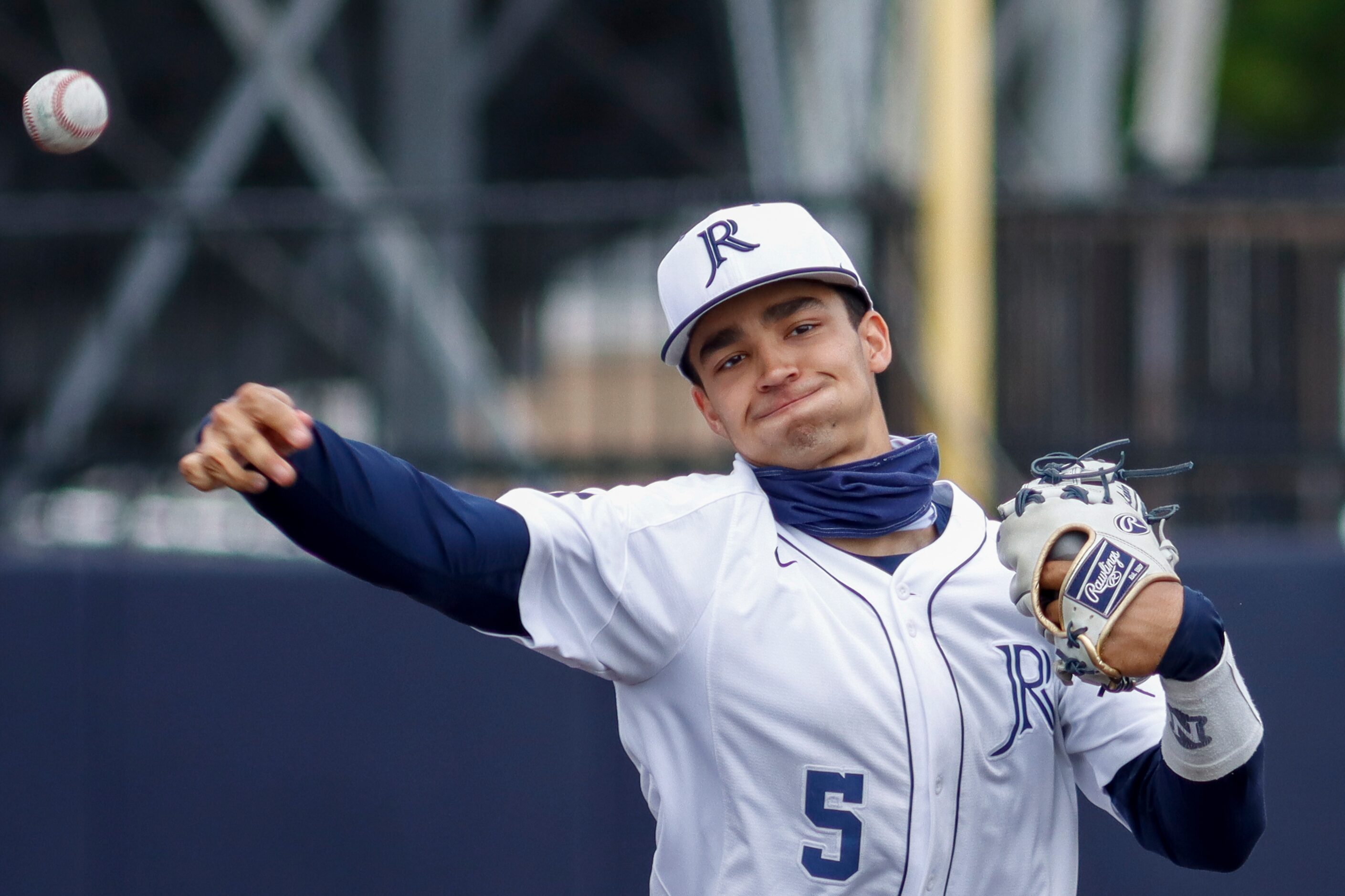 Jesuit shortstop Jordan Lawlar throws in between innings during a district 7-6A game against...