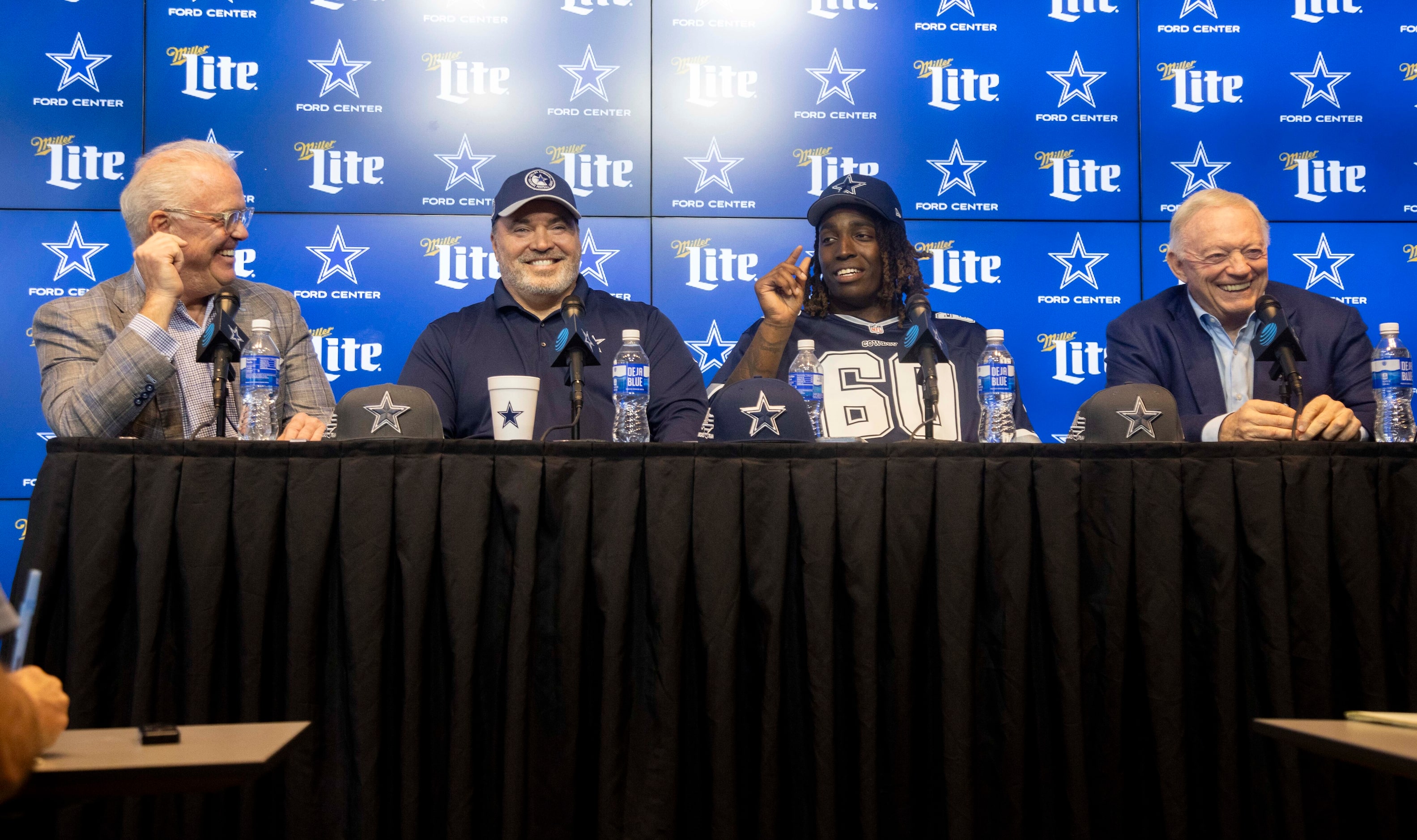 From left, Dallas Cowboys executive vice president Stephen Jones, head coach Mike McCarthy,...