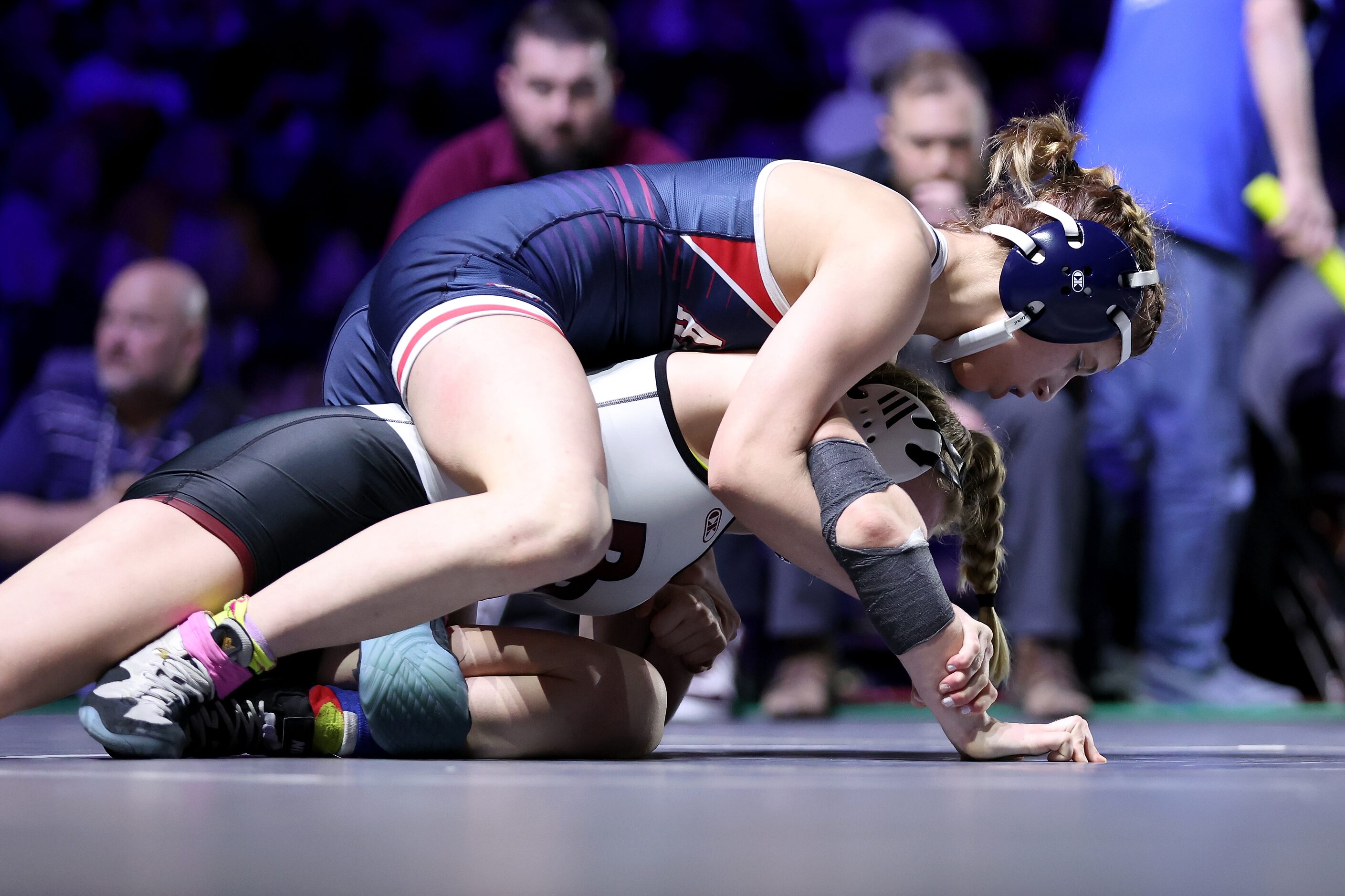 Kailin Sebert of Allen (blue) competes against Brooke McCurley of Round Rock in the Girls 6A...