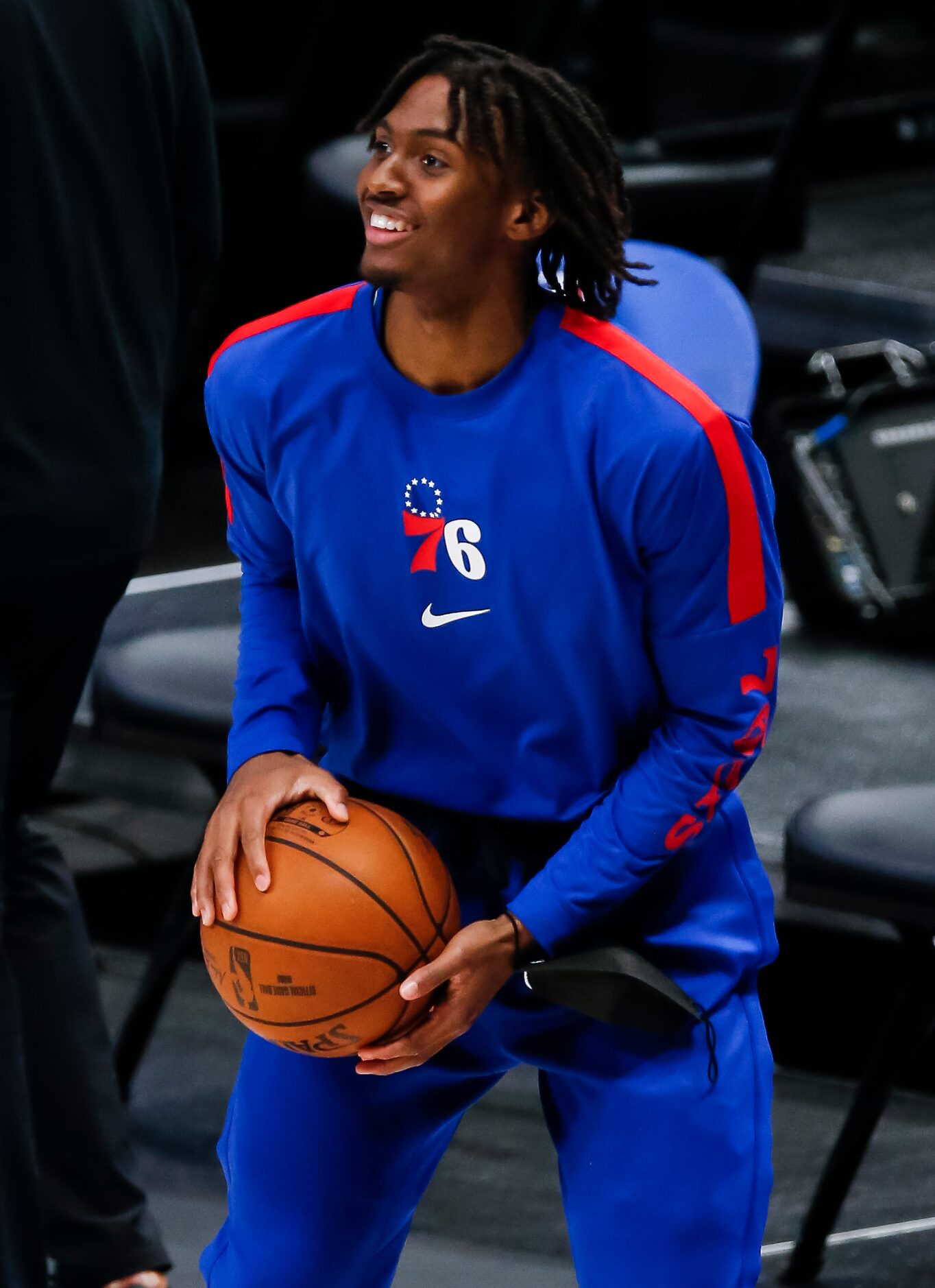 Philadelphia 76ers guard Tyrese Maxey warms up before the start of the second half of an NBA...