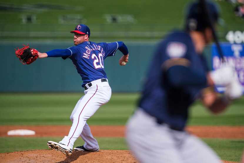 Texas Rangers pitcher Zach McAllister pitches during the second inning of a spring training...