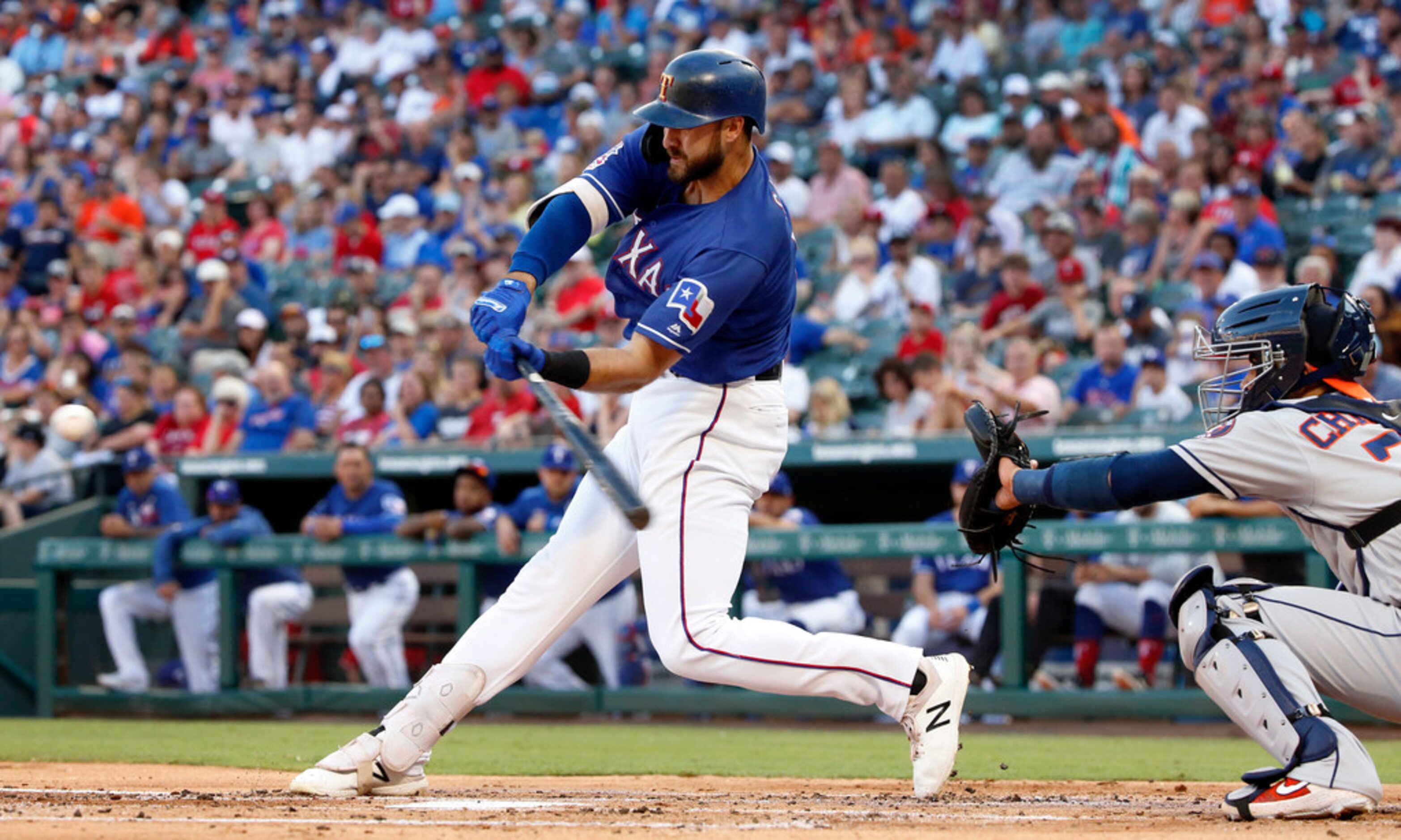 Texas Rangers center fielder Joey Gallo (13) strokes a first inning double against the...