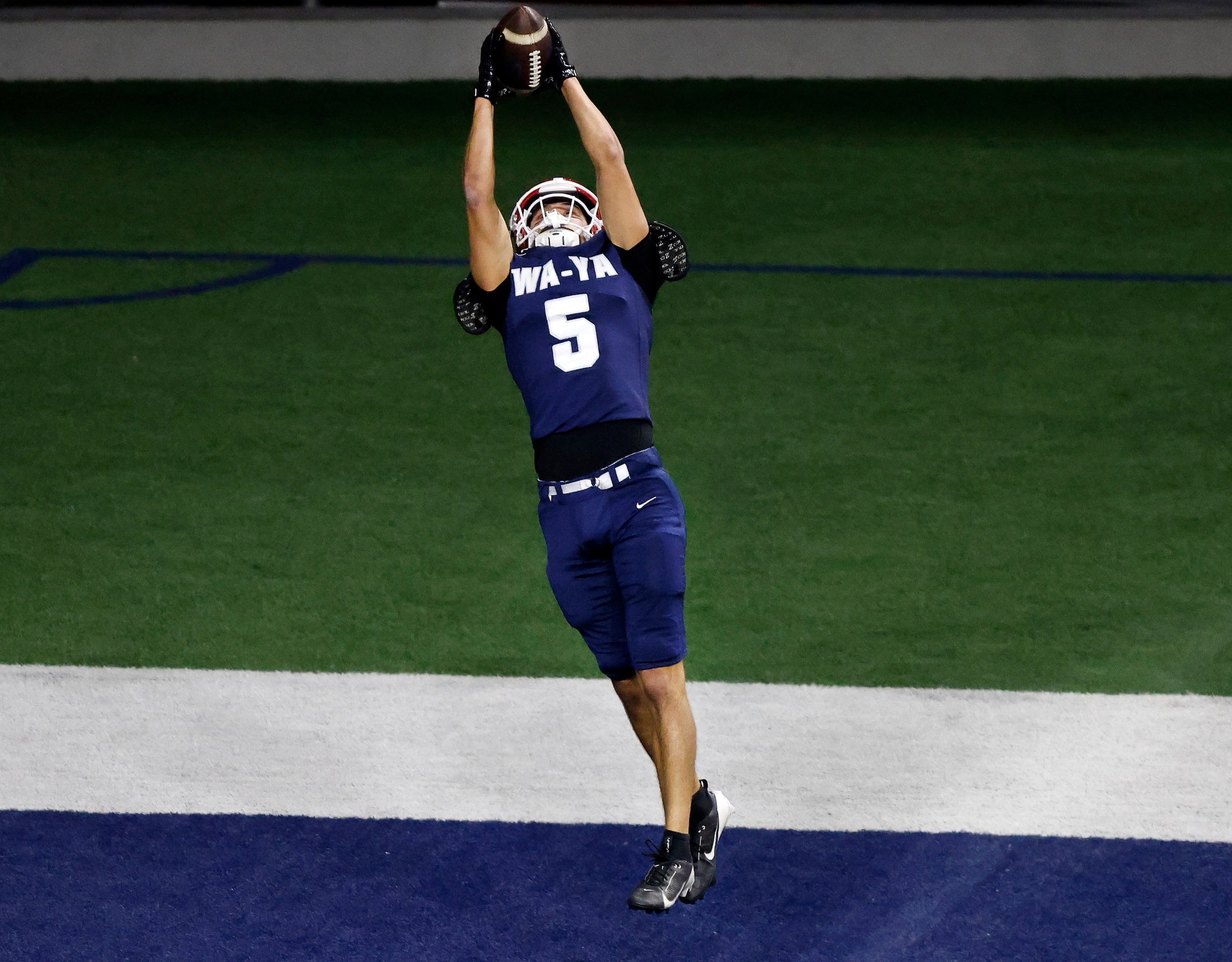 Wa-Ya receiver Nathan Benzie (5) of Brophy College Preparatory (Phoenix, AZ) pulls down a...