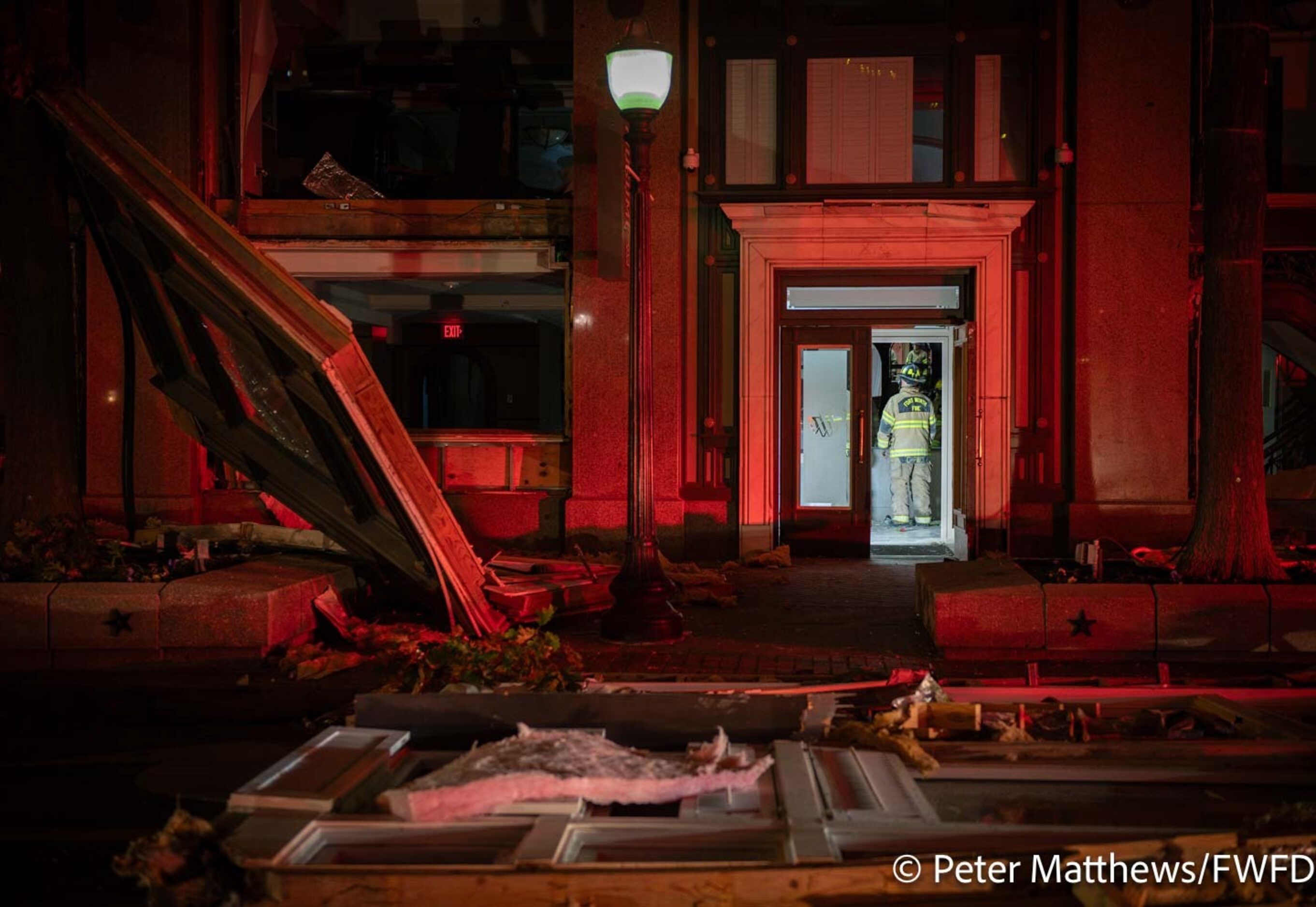 Fort Worth firefighters respond to an explosion at the Sandman Signature Hotel building in...