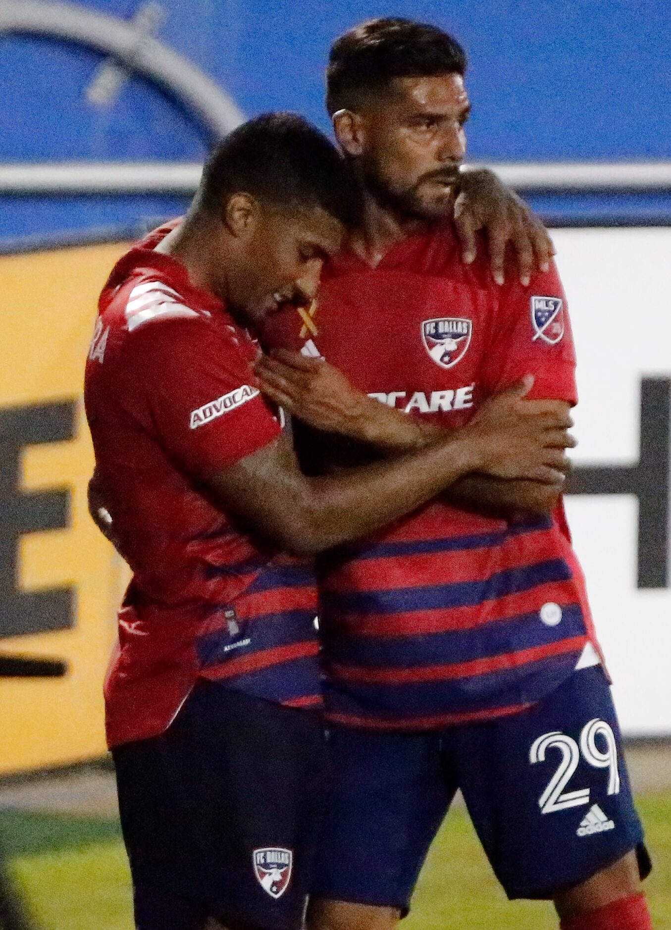 FC Dallas midfielder Santiago Mosquera (11) embraces FC Dallas forward Franco Jara (29)...