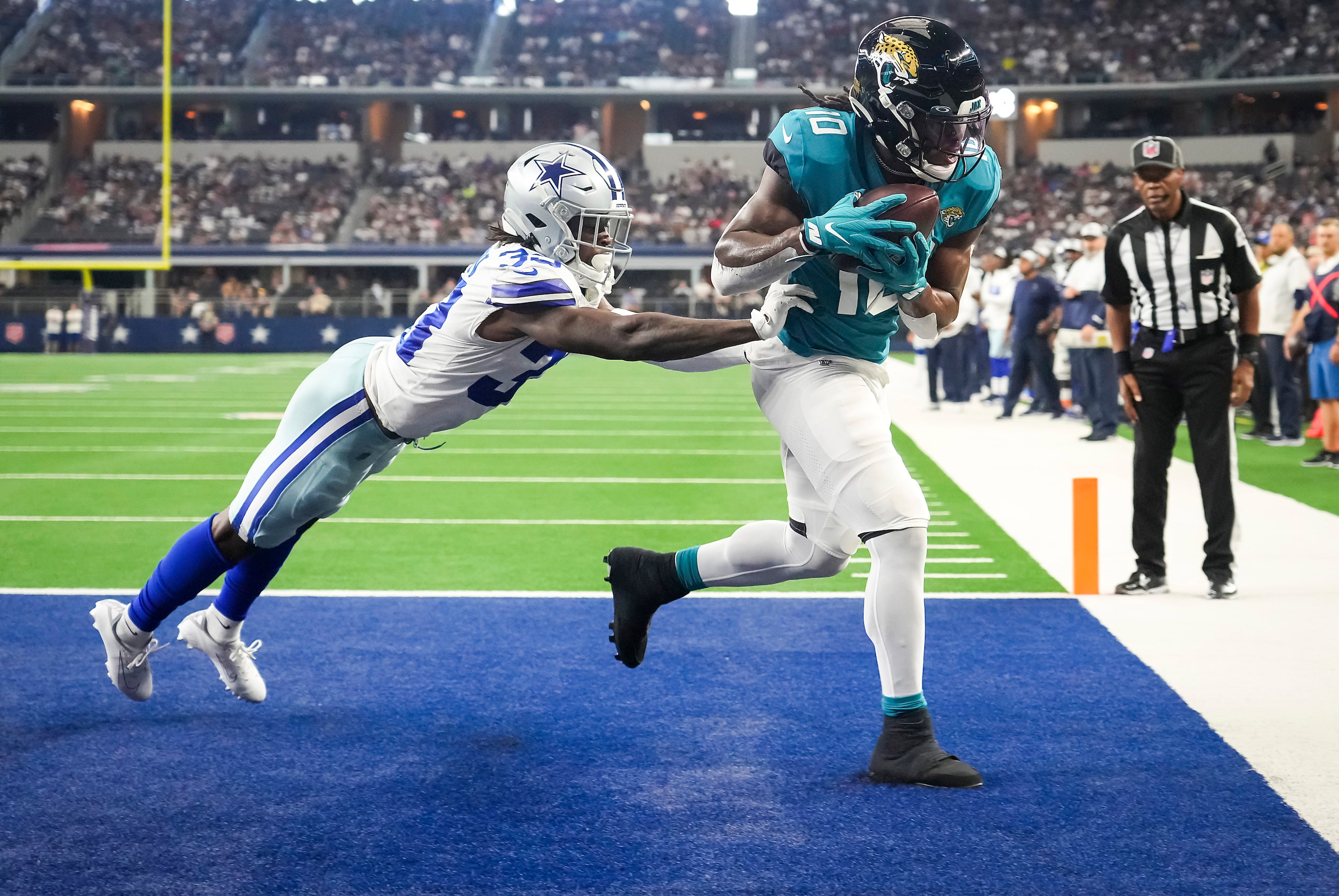 Jacksonville Jaguars wide receiver Laviska Shenault Jr. (10) hauls in a touchdown  pass as...