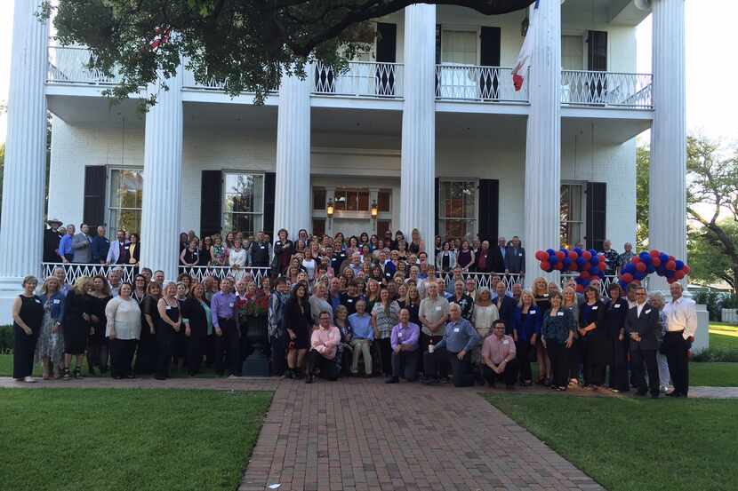  Duncanville High School class of 1976 gathered with Gov. Greg Abbott on the lawn of the...