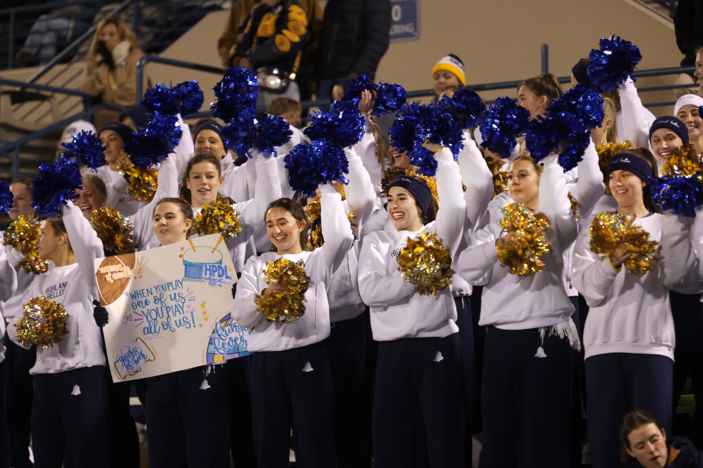 Highland Park students cheer during a high school football playoff game against Frisco...