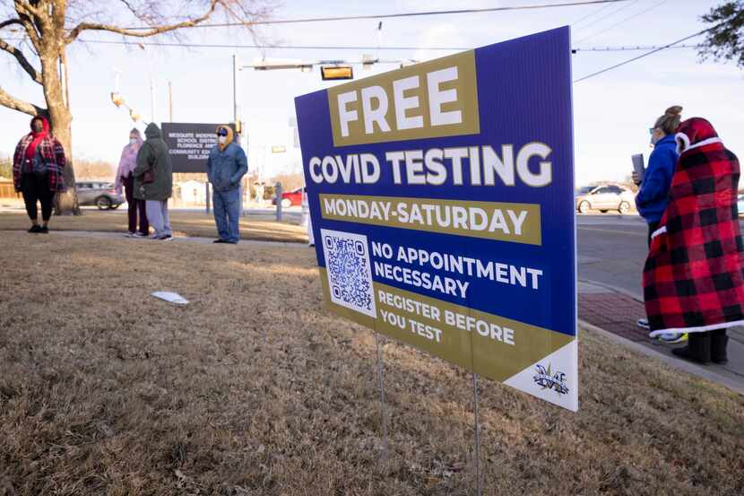People wait in line to receive free COVID testing from Mesquite ISD Health Services on...