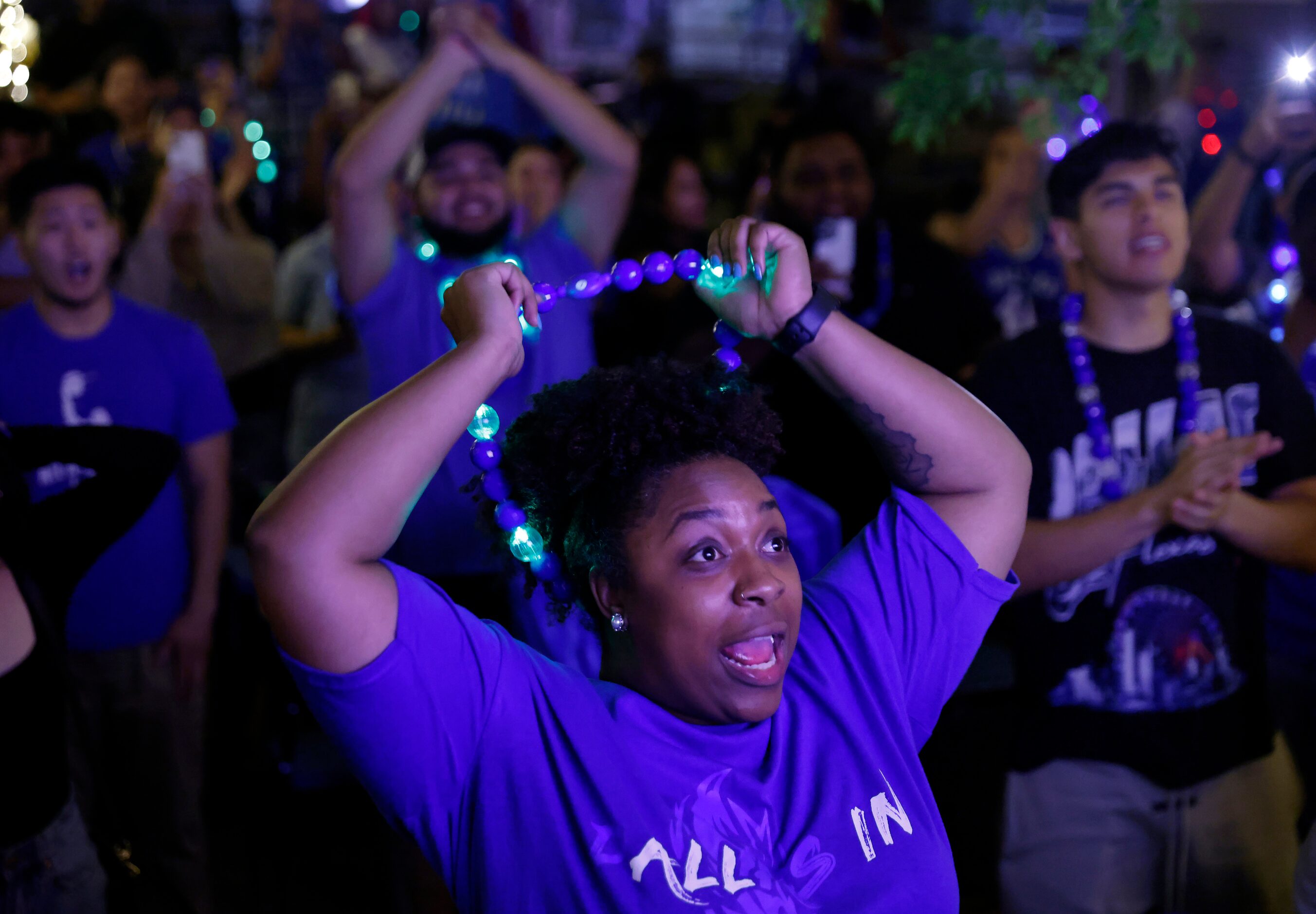 A Dallas Mavericks fan celebrate as the final seconds tick off their series win over the...