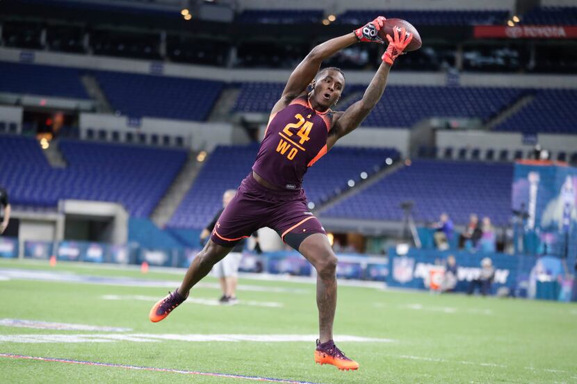 Texas wide receiver Lil'Jordan Humphrey runs a drill at the NFL football scouting combine in...