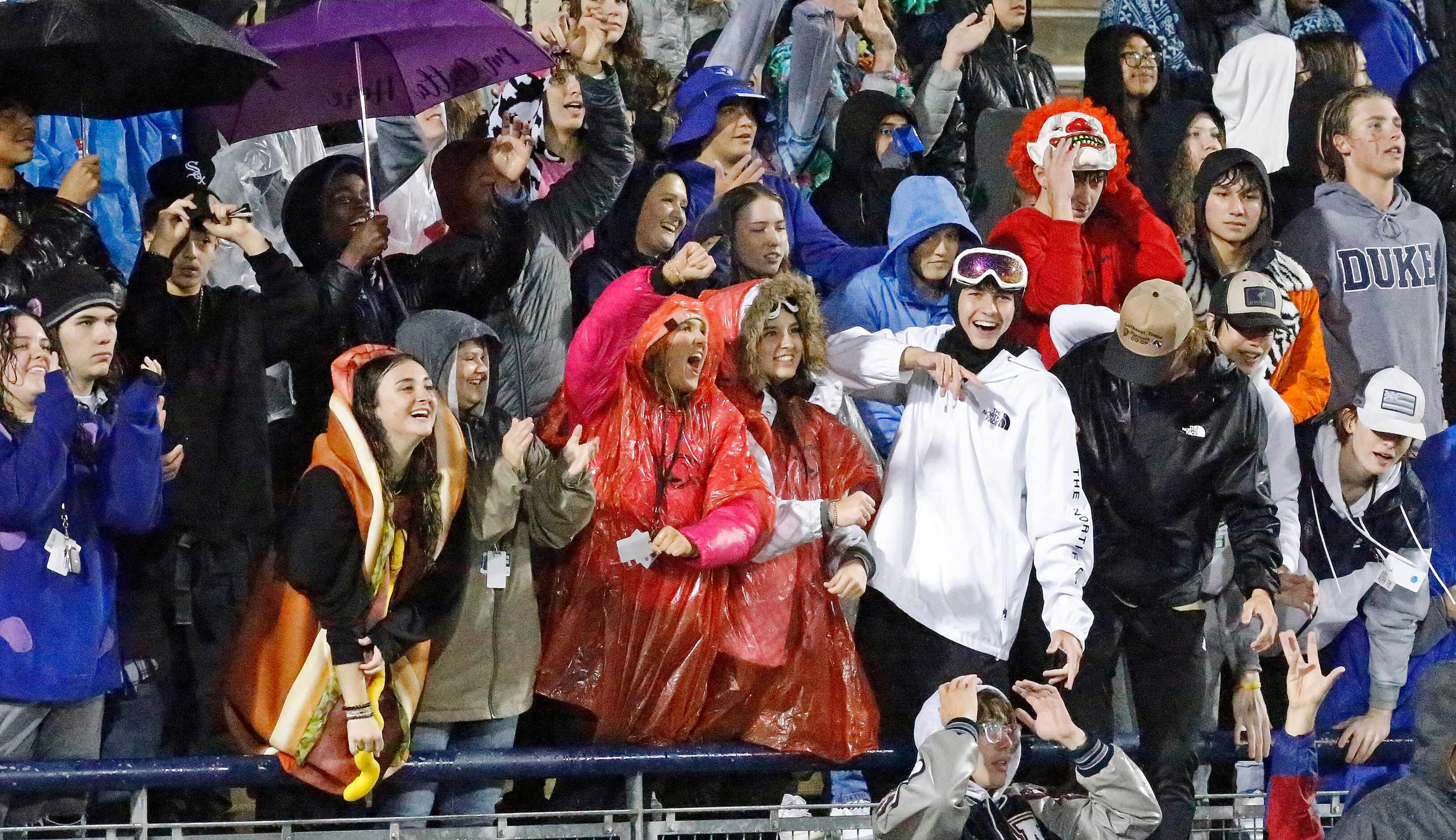 The Allen High School student section reacts after a score during the first half as Allen...