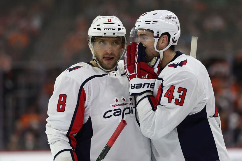 PHILADELPHIA, PA - MARCH 18: Alex Ovechkin #8 of the Washington Capitals and Tom Wilson #43...