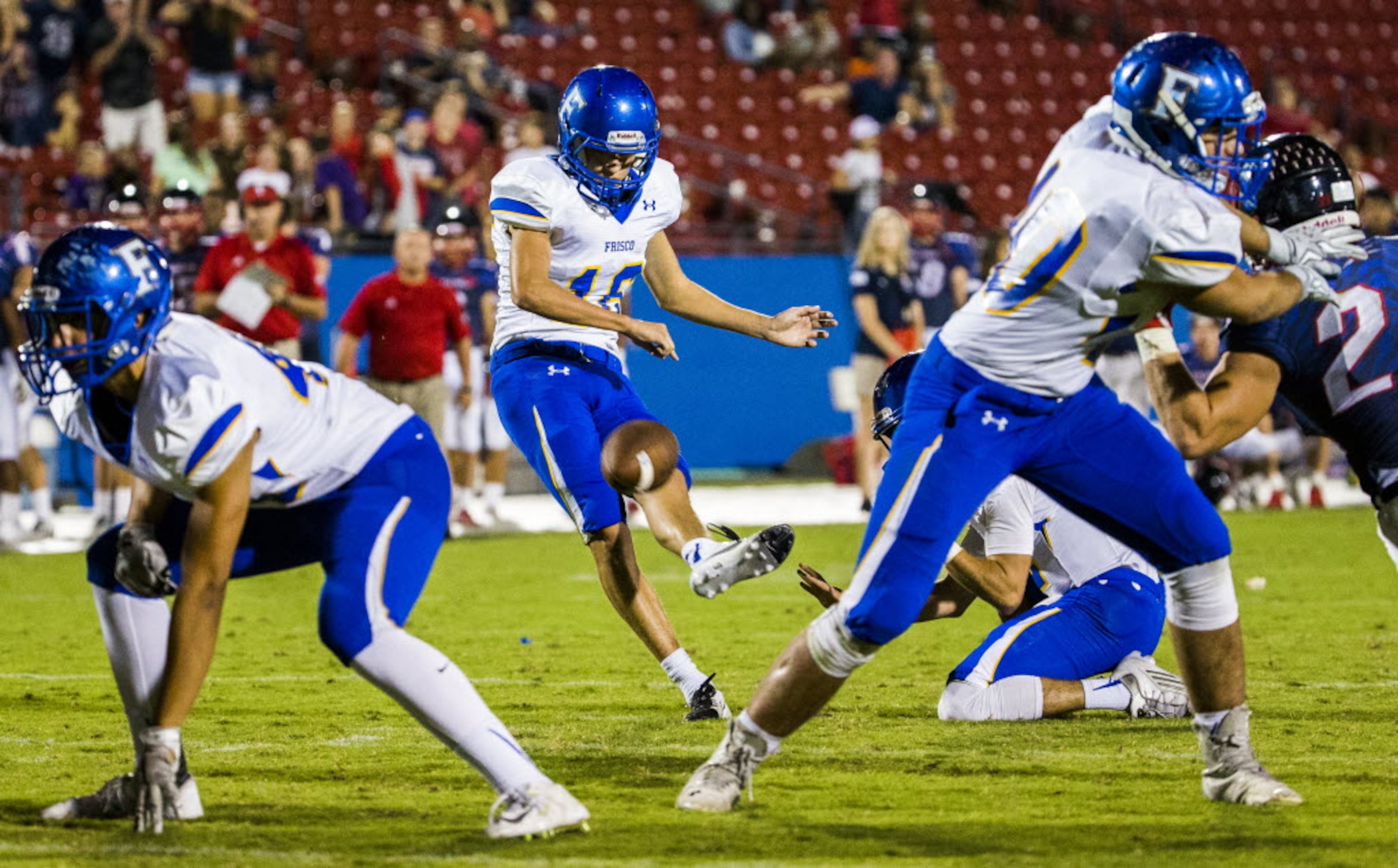 Frisco kicker Luke Wadley (16) kicks a field goal in overtime of their game against Frisco...