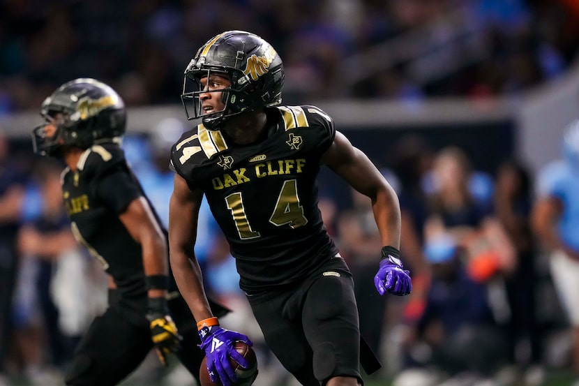 South Oak Cliff defensive lineman Dewalon Butler (14) celebrates after recovering a fumble...