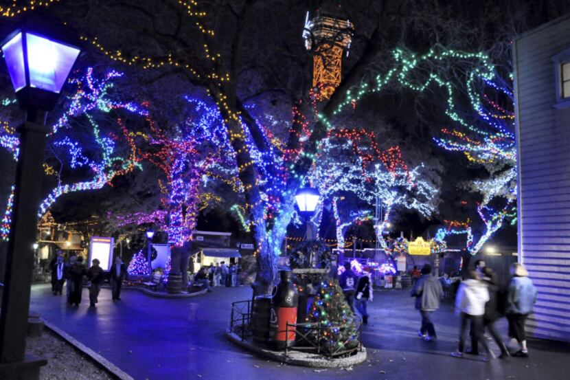 Holiday in the Park at Six Flags Over Texas features more than a million lights, as well as...