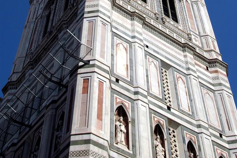 
The bell tower of the duomo in Florence glows in soft, muted colors. 
