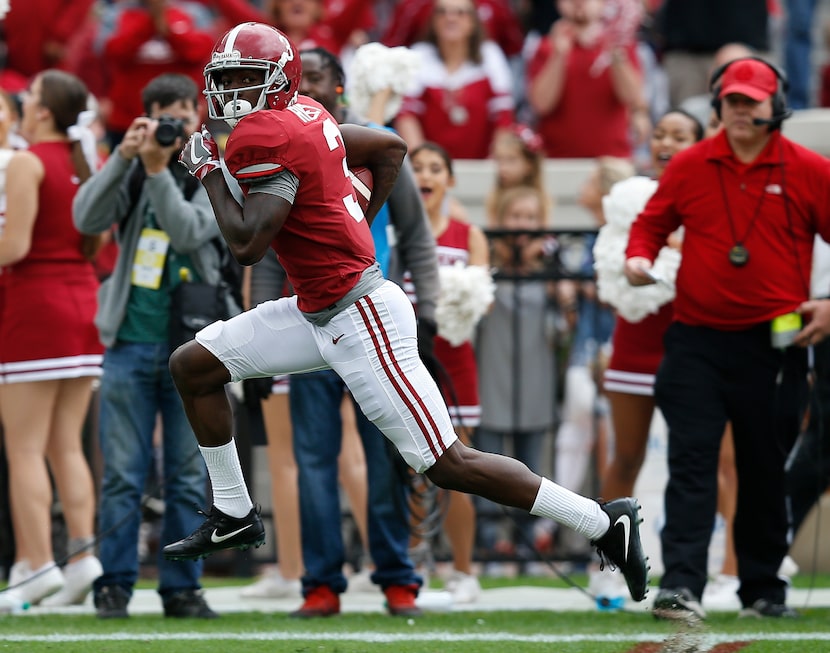 FILE - Alabama wide receiver Calvin Ridley runs in to score a touchdown against Mercer...