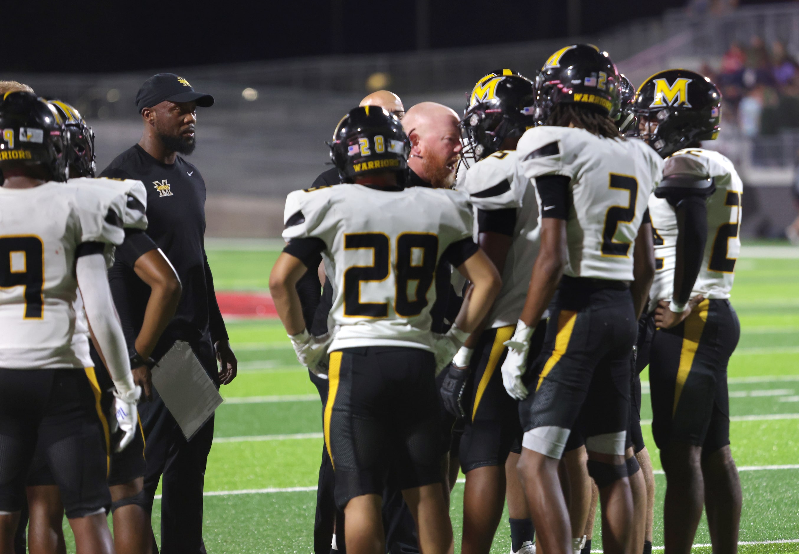 Coach Kirk McBride headbutts a Memorial player as he shows his frustration during a timeout...