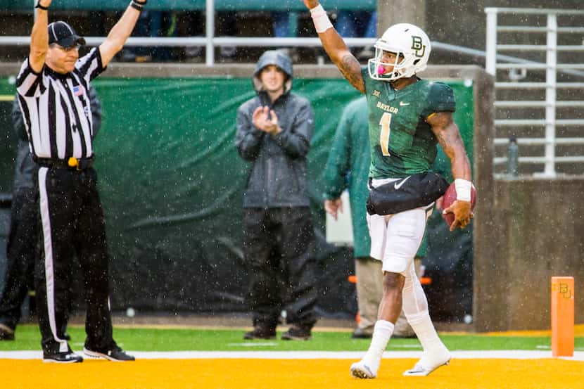 Baylor Bears wide receiver Corey Coleman (1) celebrates after scoring a touchdown during the...