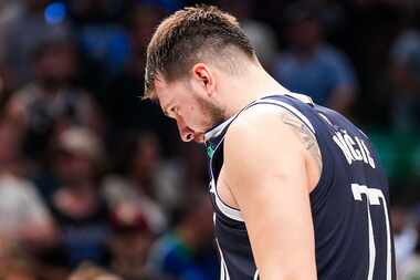 Dallas Mavericks guard Luka Doncic reacts after missing a free throw in the final seconds of...