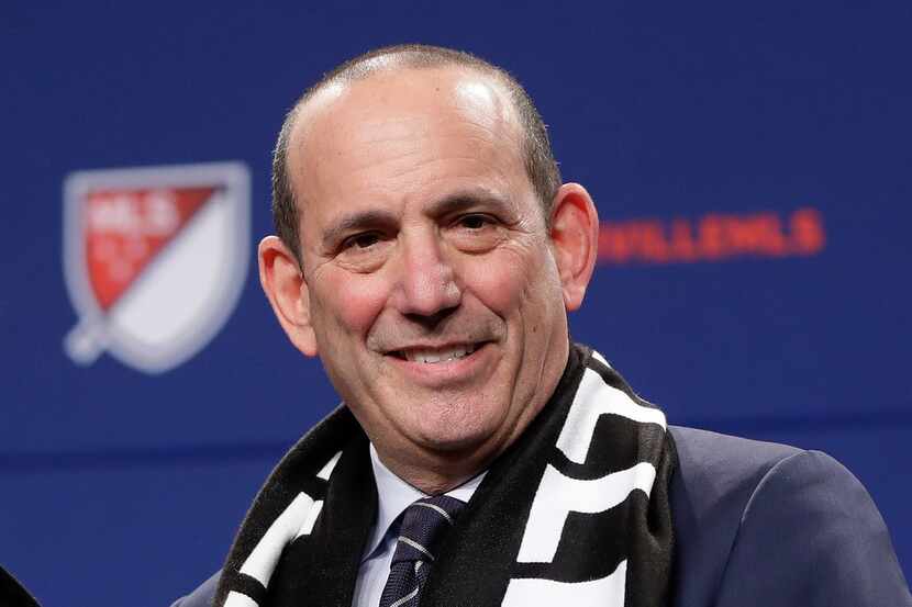FILE - In this Dec. 20, 2017, file photo, Major League Soccer commissioner Don Garber smiles...