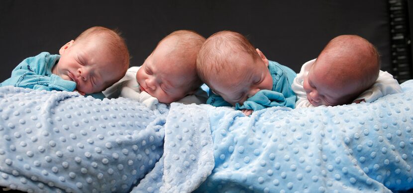 Identical quadruplets (from left) Harrison, Hardy, Henry and Hudson Marr snuggled for a...