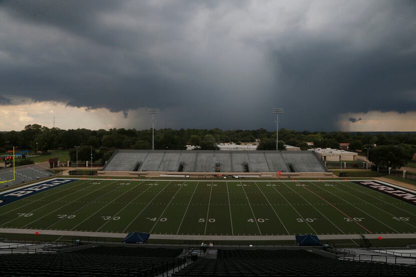 Lightning and a flash flood warnings went into effect prior to the Coppell-LD Bell high...