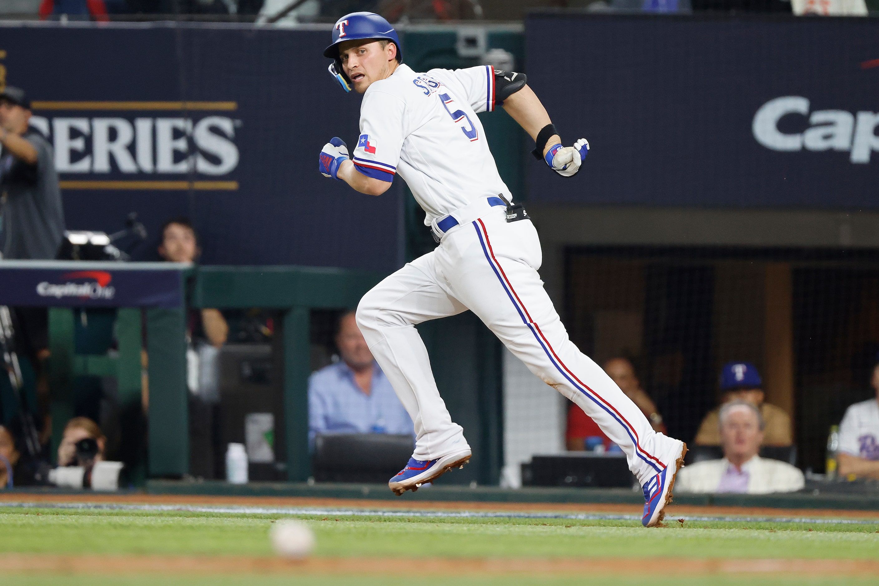 Texas Rangers' Corey Seager watches a hit roll foul during the sixth inning in Game 2 of the...