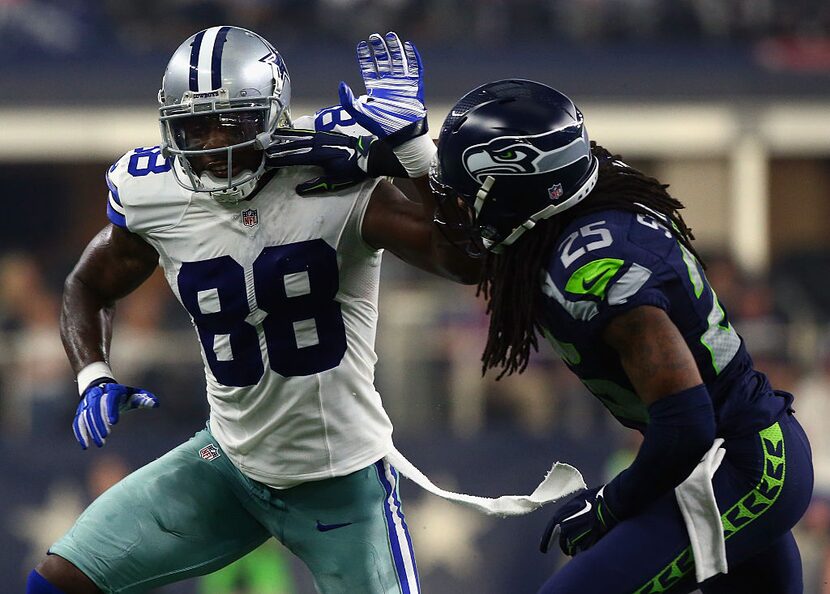 ARLINGTON, TX - NOVEMBER 01:   Dez Bryant #88 of the Dallas Cowboys runs against Richard...