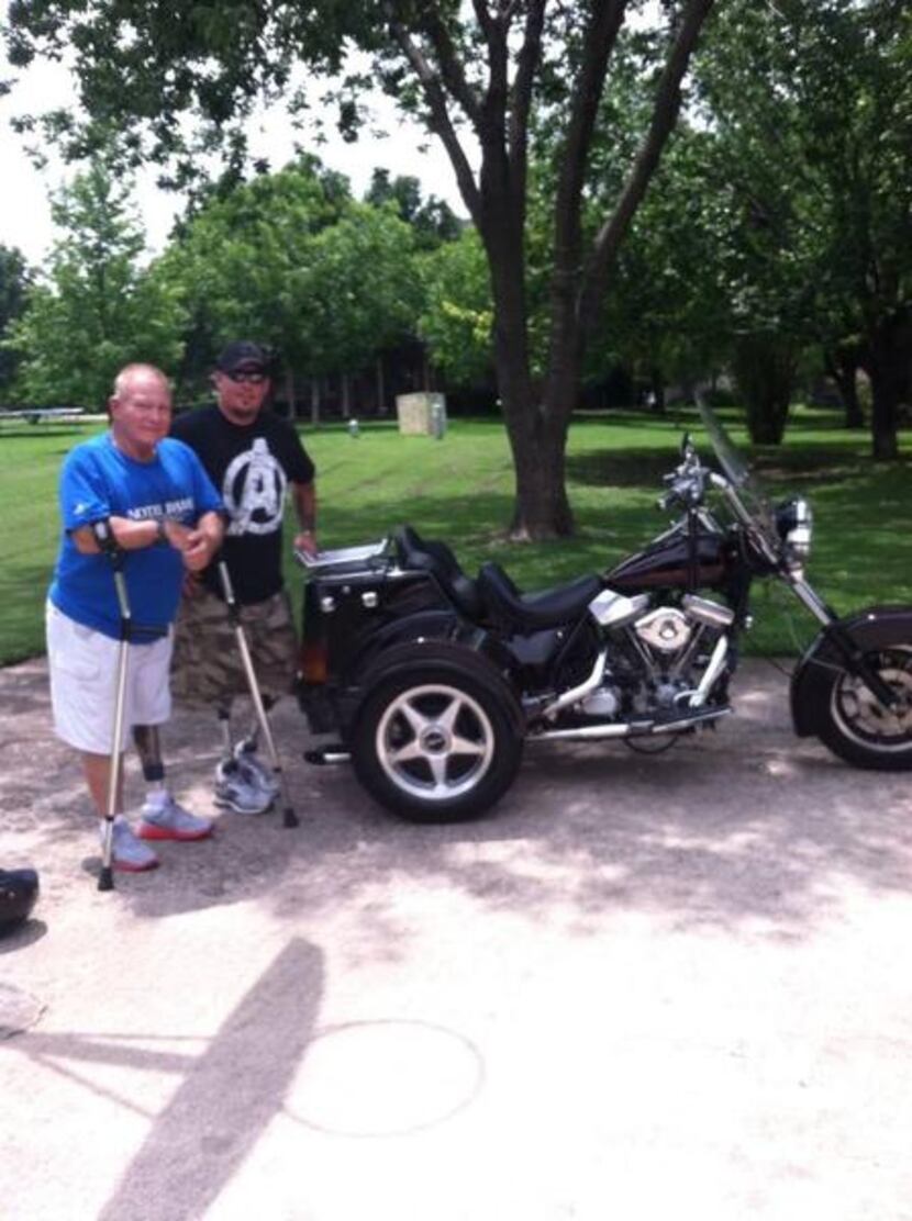 
Rick Collins (left) sold his motorcycle -- retrofitted so the gears could be changed with a...