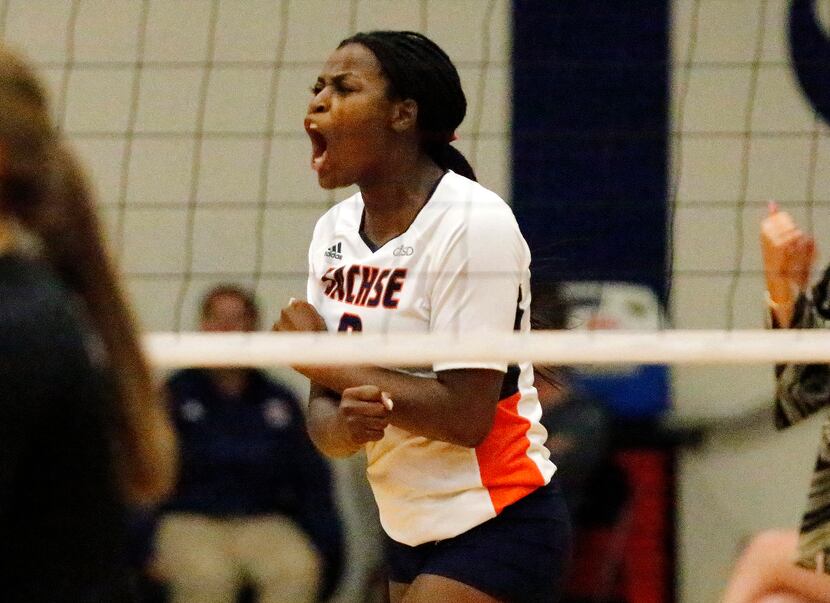 Sachse High School Alicia Hearn (8) cheers after a point during game one as Sachse High...