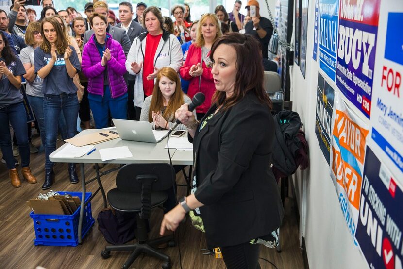 Natalie Portman looks on as Mary Jennings "MJ" Hegar, then the Democratic nominee for Texas'...